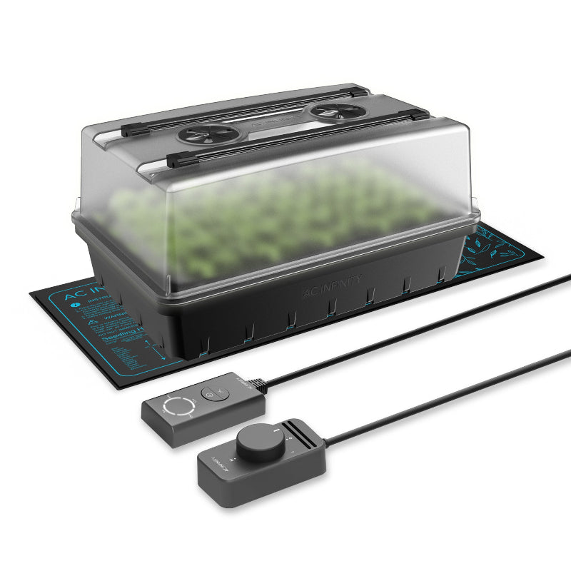 AC Infinity humidity dome propagation kit with clear dome cover, ventilation slots, 5x8 cell seedling tray, and digital controllers for indoor plant propagation and seed starting.