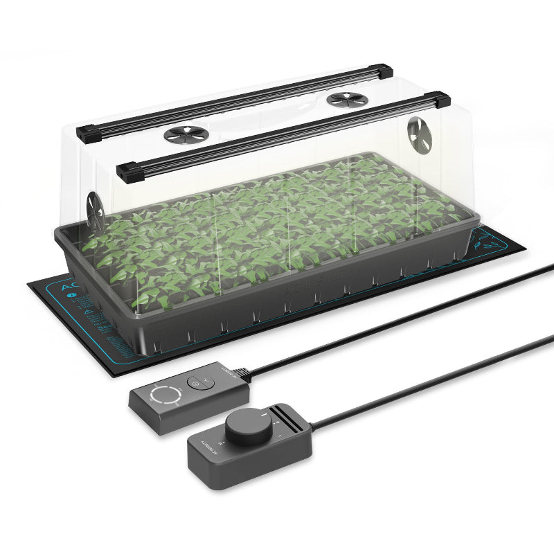 Complete humidity dome propagation system with dual LED grow light bars, transparent dome, seedling tray on heating mat, and dual controllers for light and temperature management.