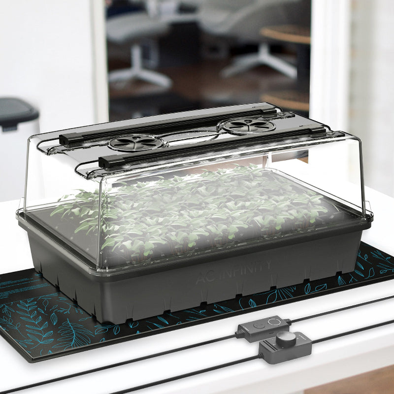 Professional humidity dome propagation kit with LED integration, adjustable height extension, and 40-cell seedling tray for indoor plant cultivation.