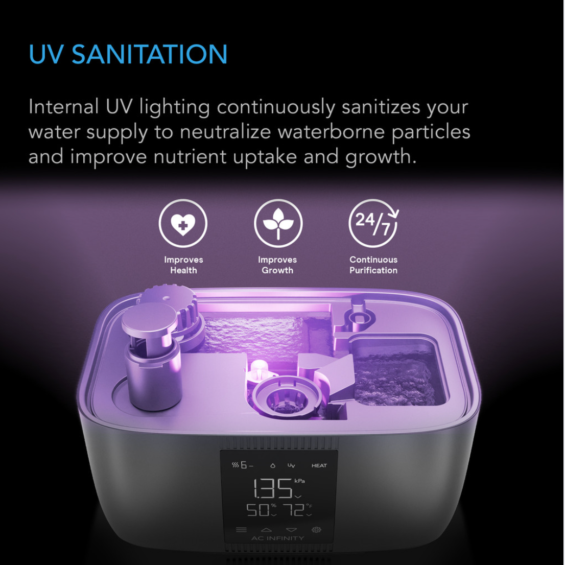 Black humidifier with digital display and flexible hose on a white background
